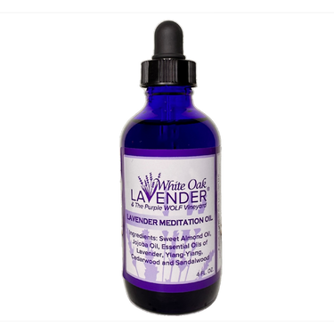 Front view of 4 oz Lavender Meditation Oil bottle showing product label ingredients and packaging