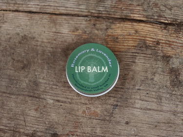 Top view of Rosemary & Lavender Lip Balm showing the product label and branding clearly