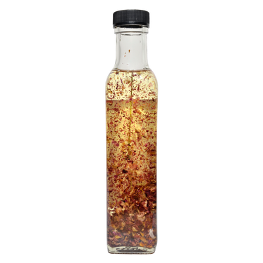 Back view of  Lavender bath oil bottle with visible bath oil inside