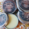Orange & Lavender Salve open jar showing smooth cream texture inside with cap removed