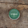 Top view of Rosemary & Lavender Lip Balm showing the product label and branding clearly