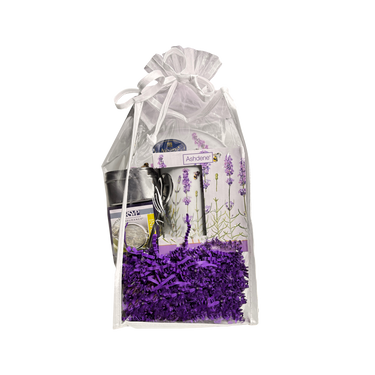 Tea Lover’s Gift Set wrapped as a gift, including bone china mug, tea strainer, spoon, hot plate, and Earl Grey Lavender Tea